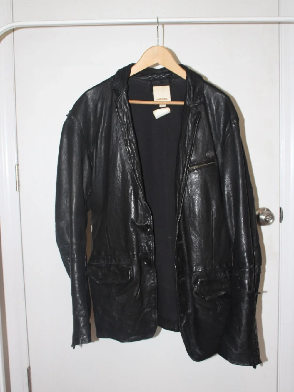 VINTAGE thrifted Diesel Men's Black Distressed Leather Jacket